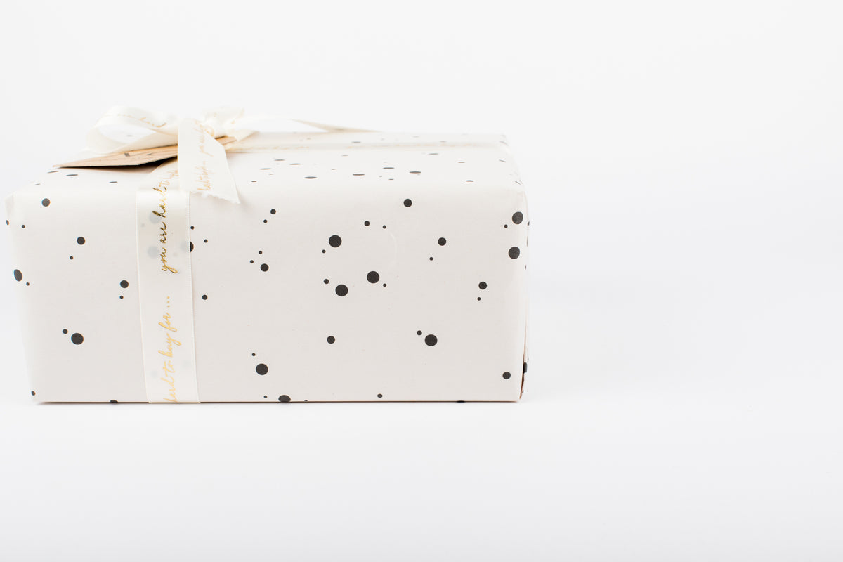 Stars and Dots on White Wrapping Paper